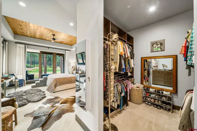 a view of a livingroom with furniture and windows