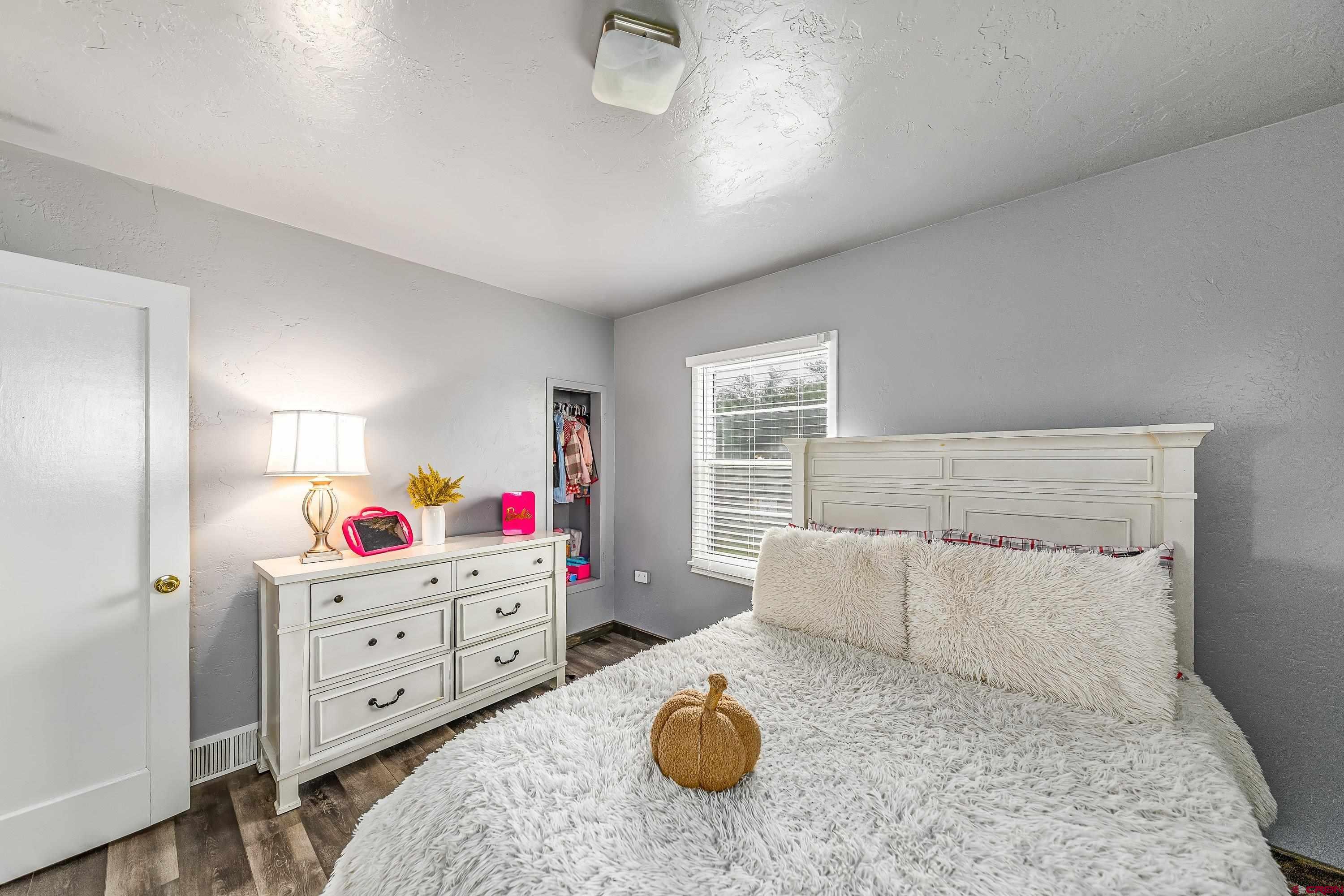 645 Leon Street Delta, CO 81416 - Photo 14 of 28 a living room with furniture and a couch