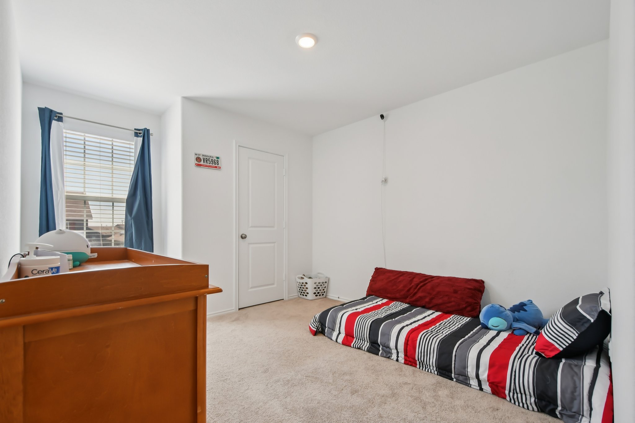 14116 Mussel Run Elgin, TX 78621 - Photo 18 of 40 Bedroom featuring light colored carpet