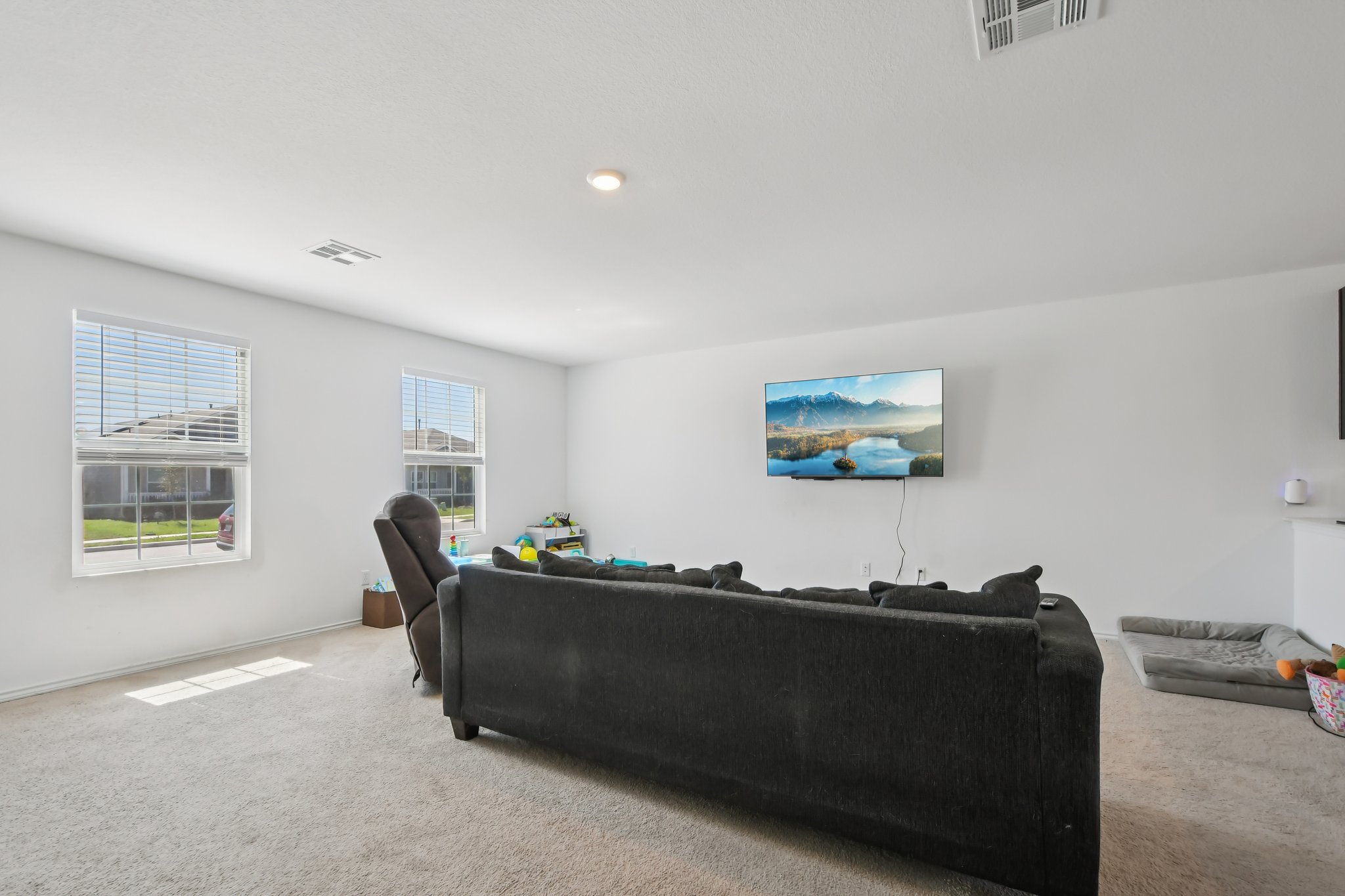 14116 Mussel Run Elgin, TX 78621 - Photo 7 of 40 Living area featuring carpet floors and baseboards