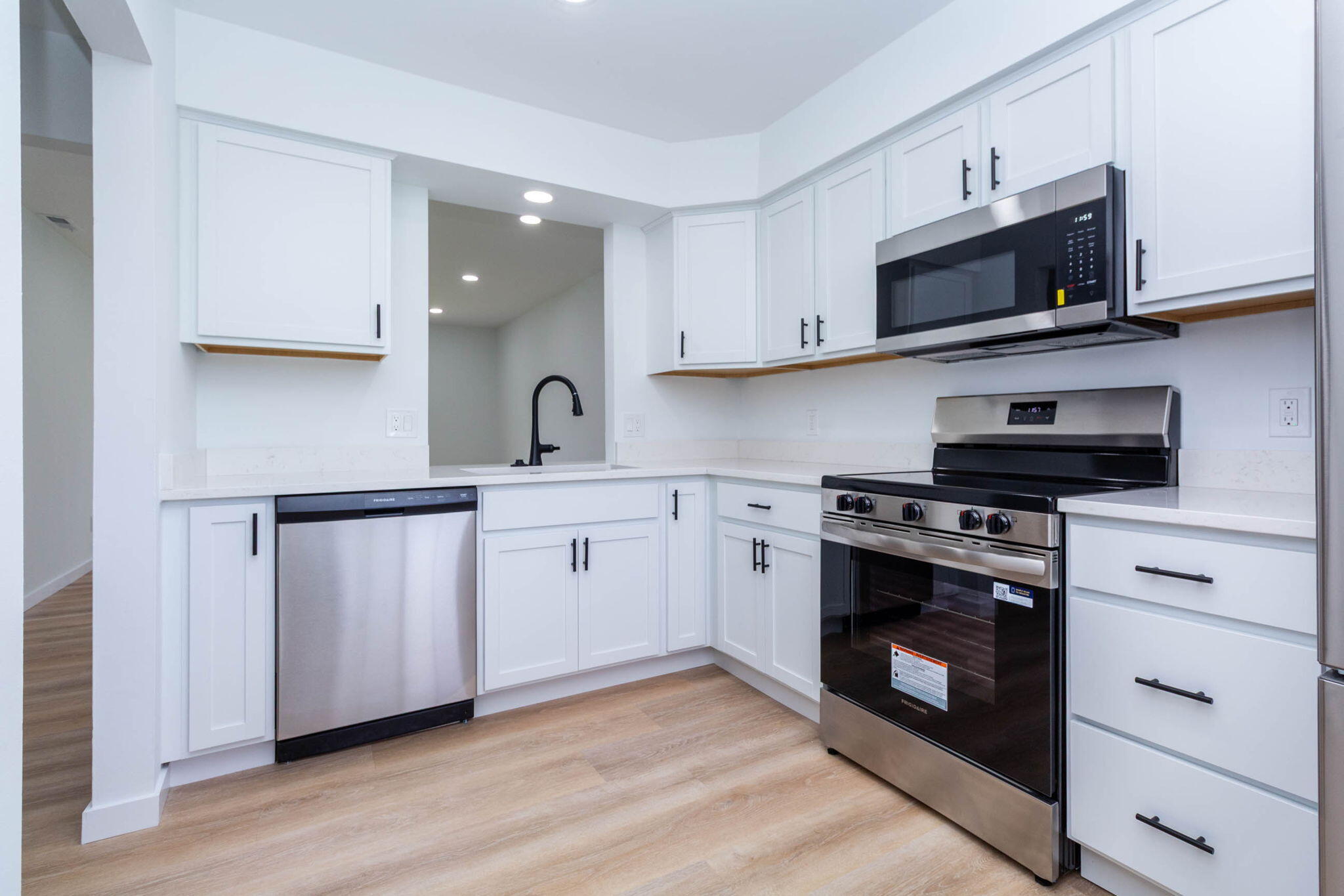 23418 Middlebelt Road, Unit 10 Farmington, MI 48336 - Photo 17 of 25 New white cabinets