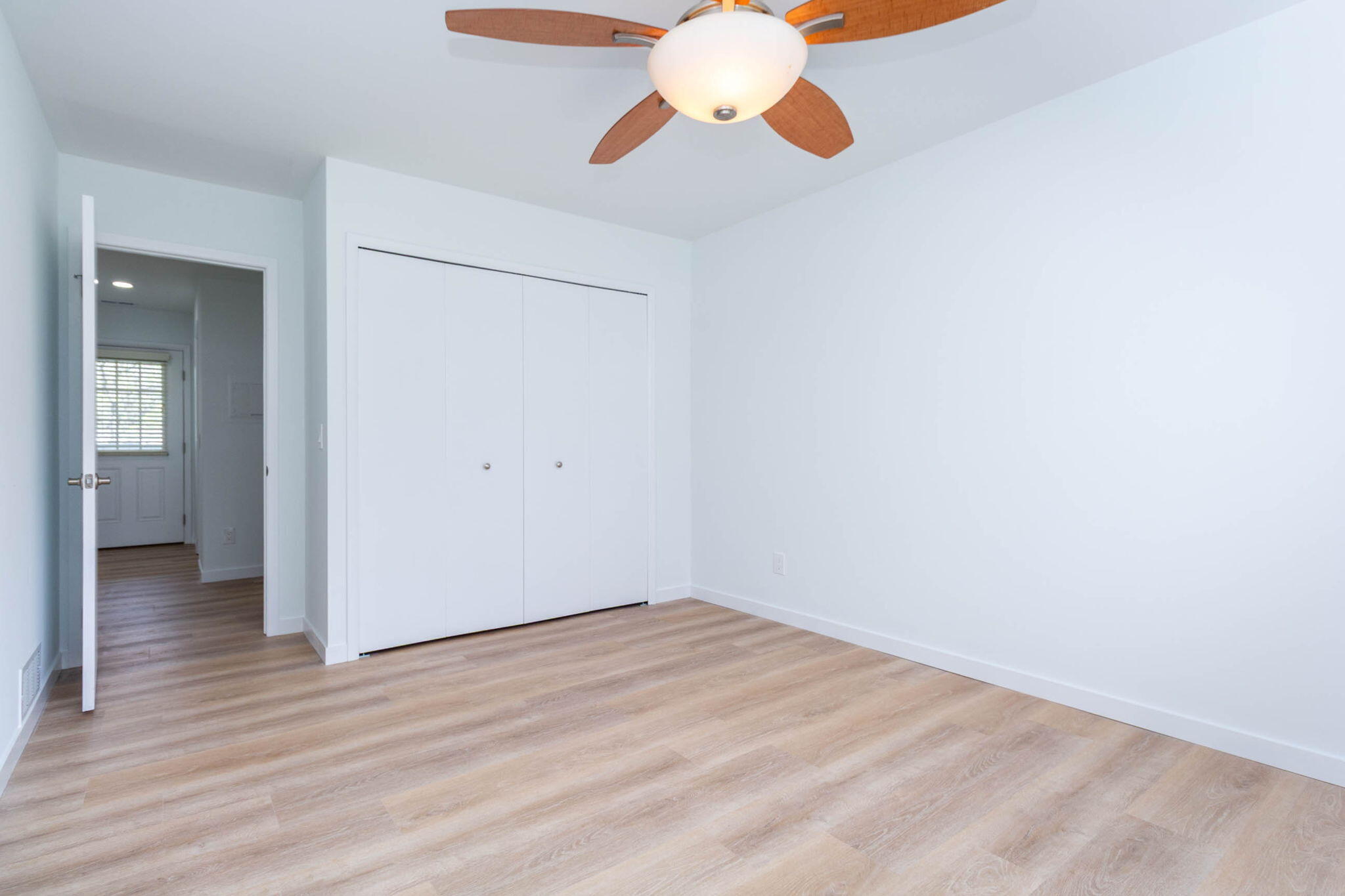 23418 Middlebelt Road, Unit 10 Farmington, MI 48336 - Photo 22 of 25 Double closet/ceiling fan