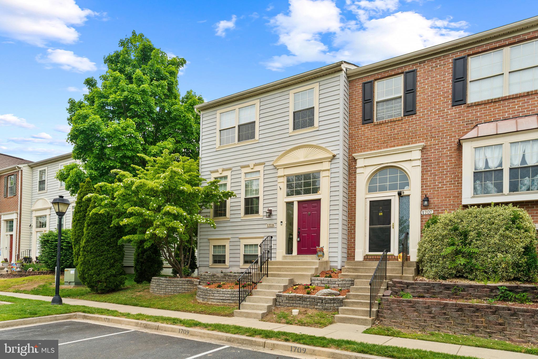 1709 Woodruff Way Frederick, MD 21701 - Photo 36 of 42 a front view of a house with a yard