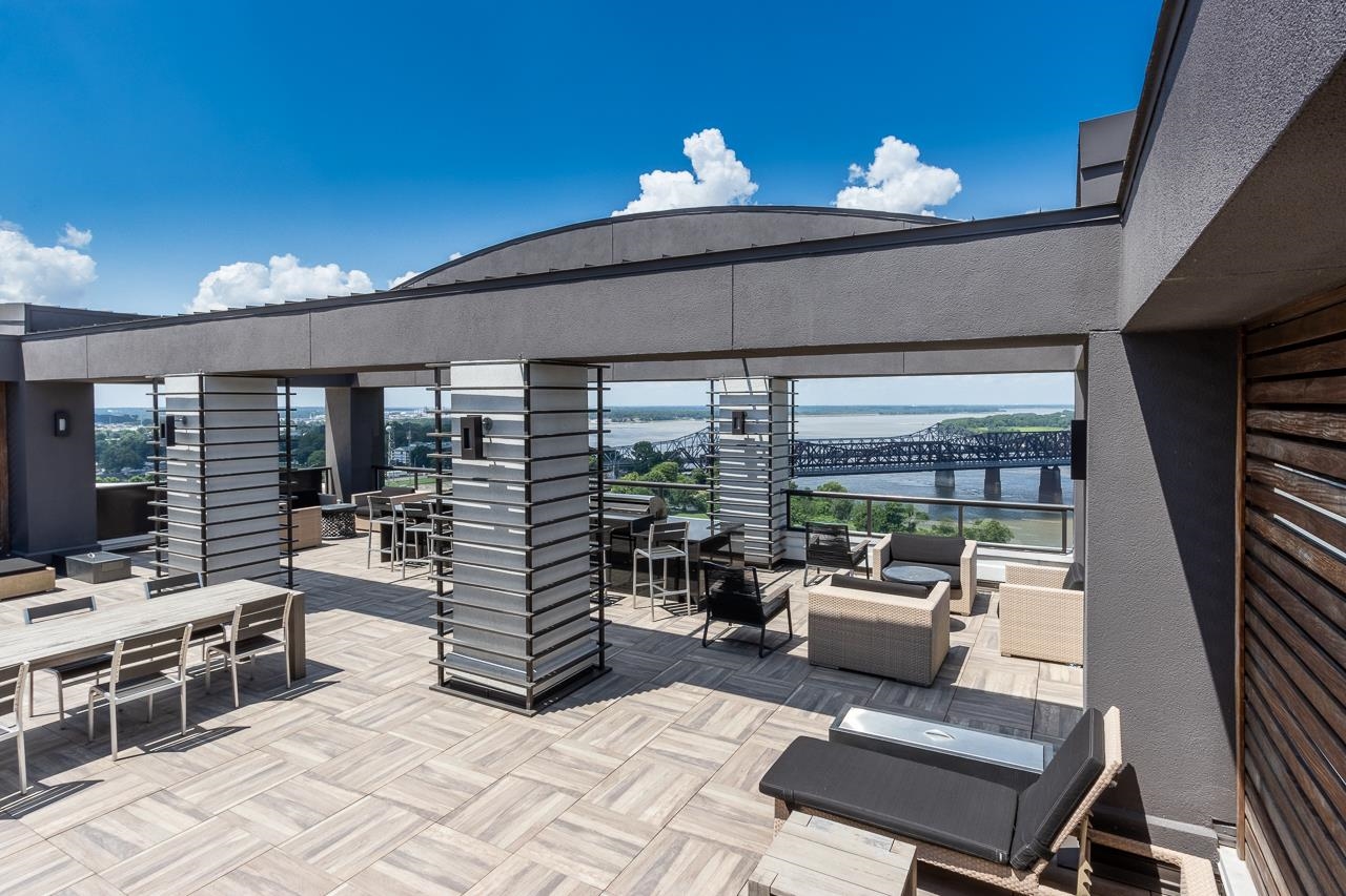 717 Riverside Drive, Unit 109 Memphis, TN 38103 - Photo 31 of 40 Common wifi, bar seating, fire features, two gas grills, restrooms, and prep kitchen with appliances. Entertain on the roof without ever having to go down to your unit!