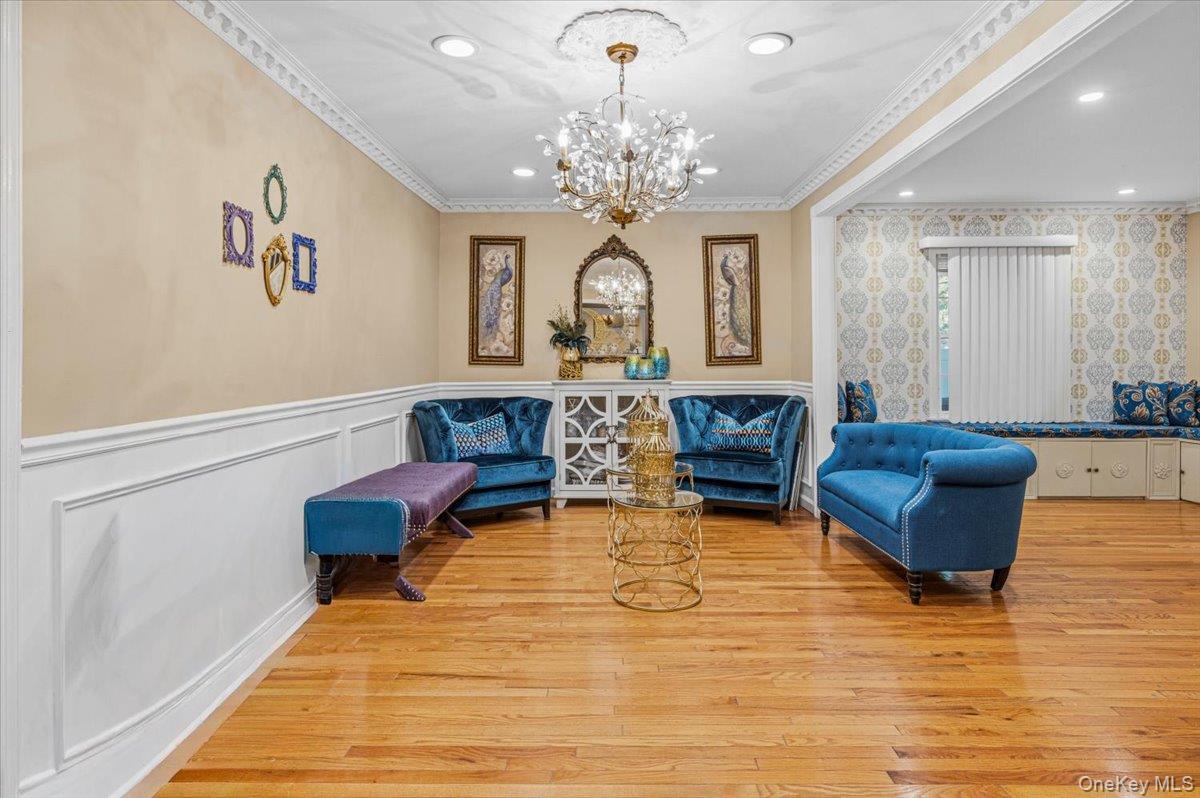 626 Caledonia Road Dix Hills, NY 11746 - Photo 19 of 49 a living room with fireplace furniture and a chandelier