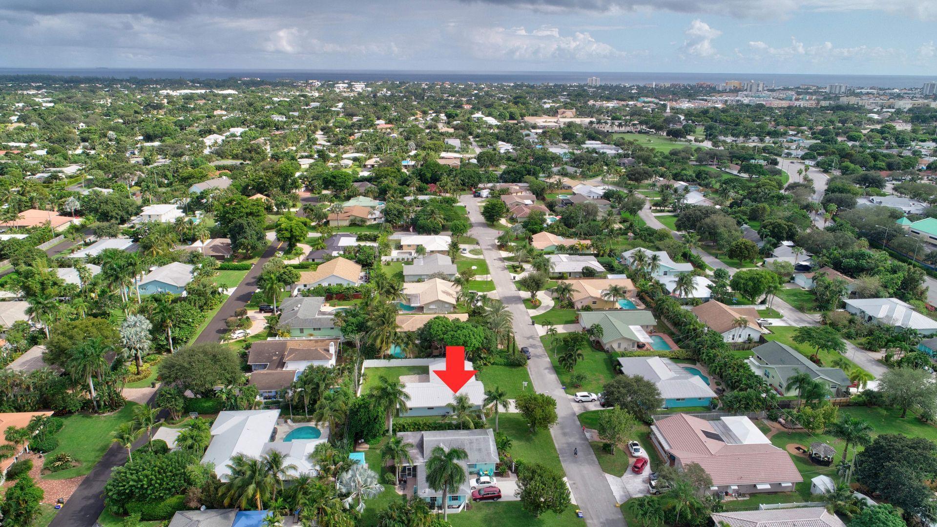 709 Sunshine Drive Delray Beach, FL 33444 - Photo 25 of 25 an aerial view of multiple house