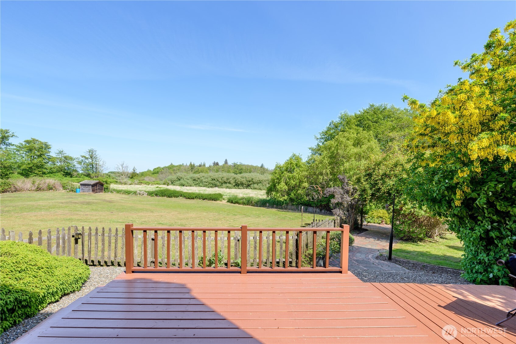 3718 Sequim-Dungeness Way Sequim, WA 98382 - Photo 14 of 40 a view of deck and lake with wooden fence