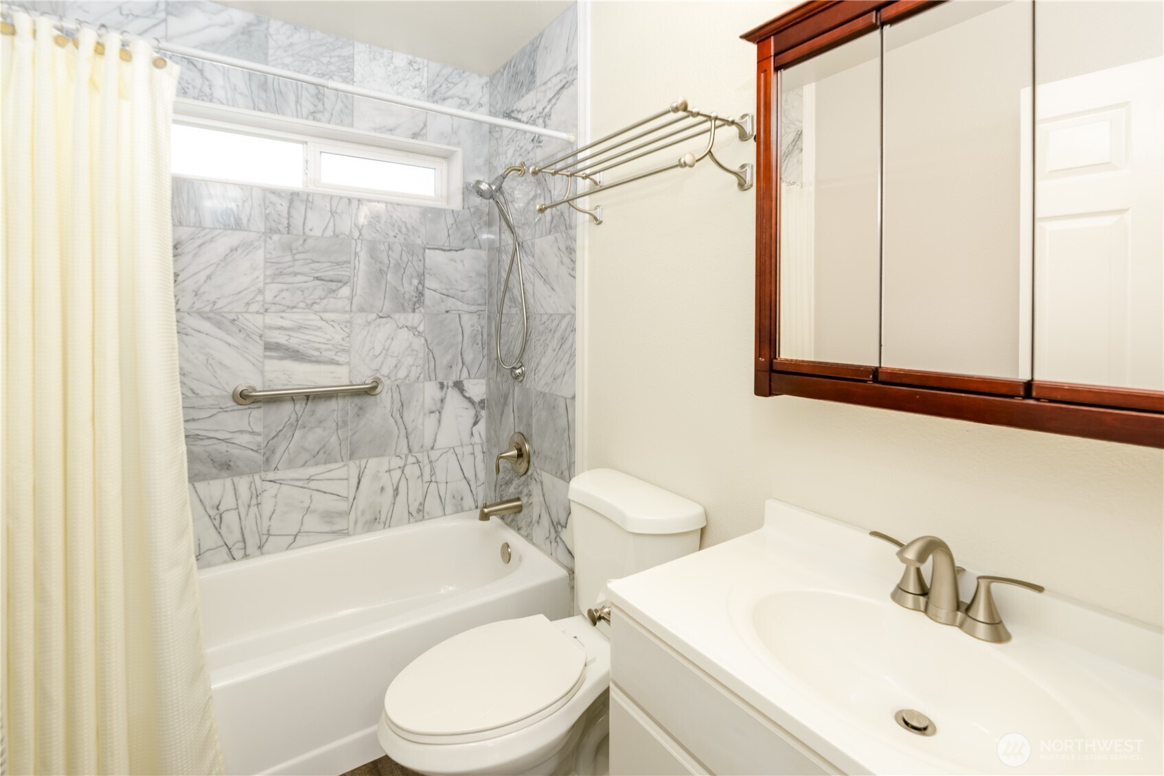 3718 Sequim-Dungeness Way Sequim, WA 98382 - Photo 17 of 40 a bathroom with a sink toilet and shower