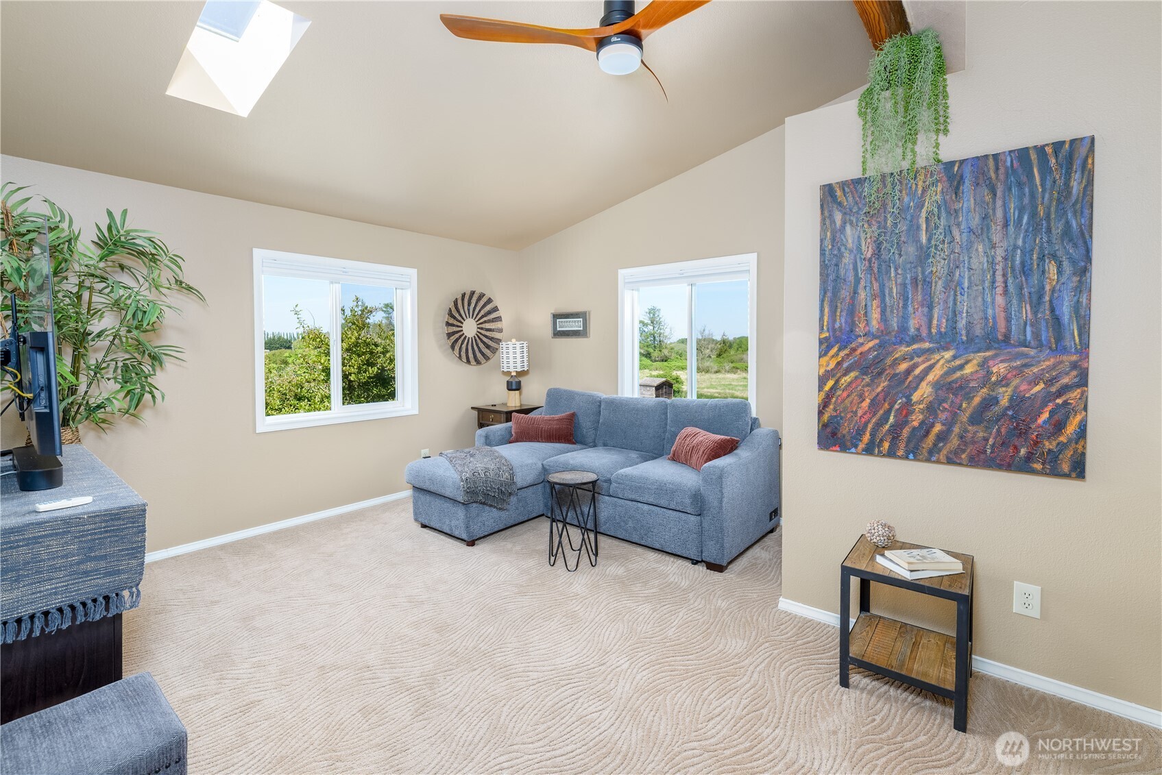 3718 Sequim-Dungeness Way Sequim, WA 98382 - Photo 19 of 40 a living room with furniture and a potted plant