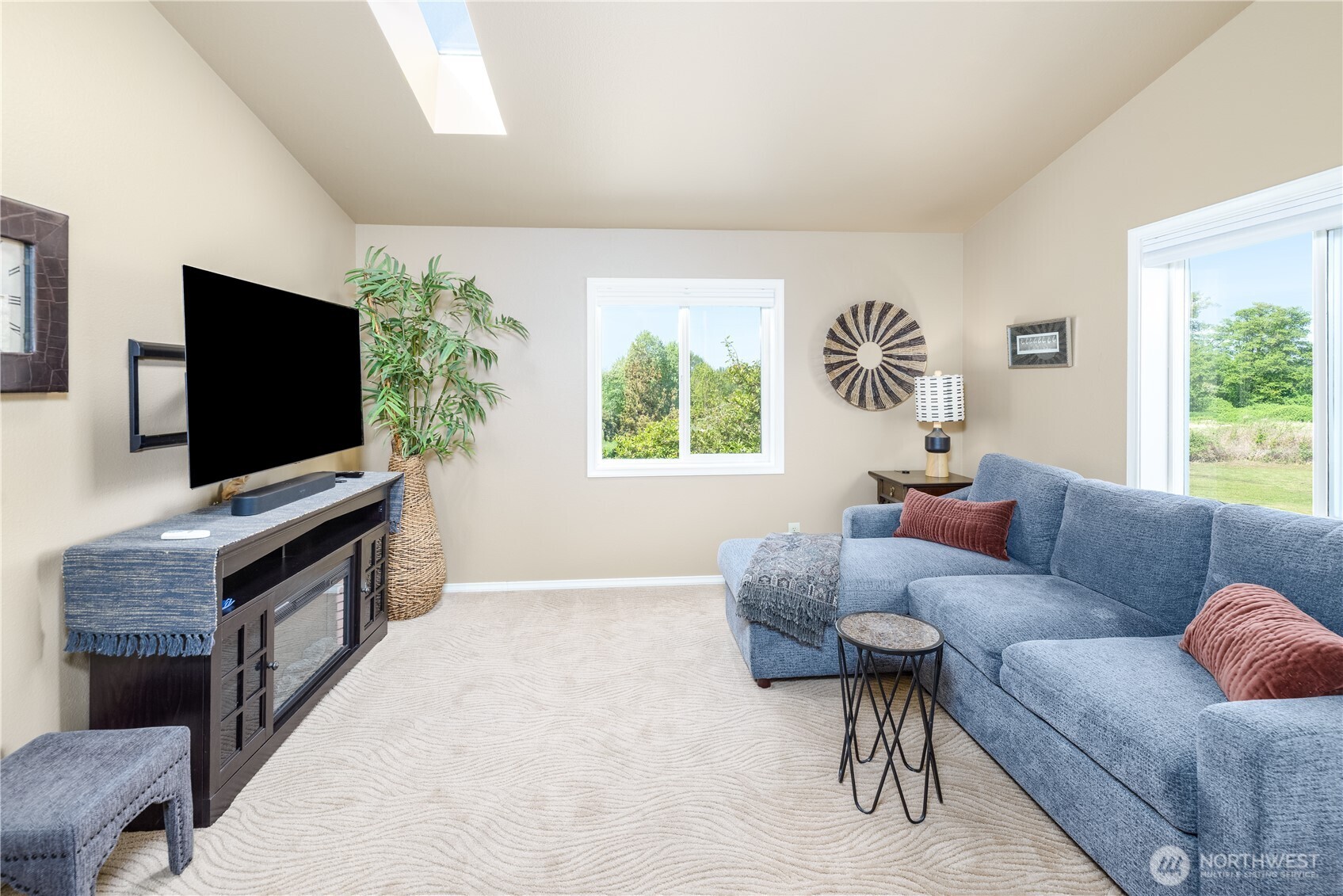 3718 Sequim-Dungeness Way Sequim, WA 98382 - Photo 20 of 40 a living room with furniture and a flat screen tv