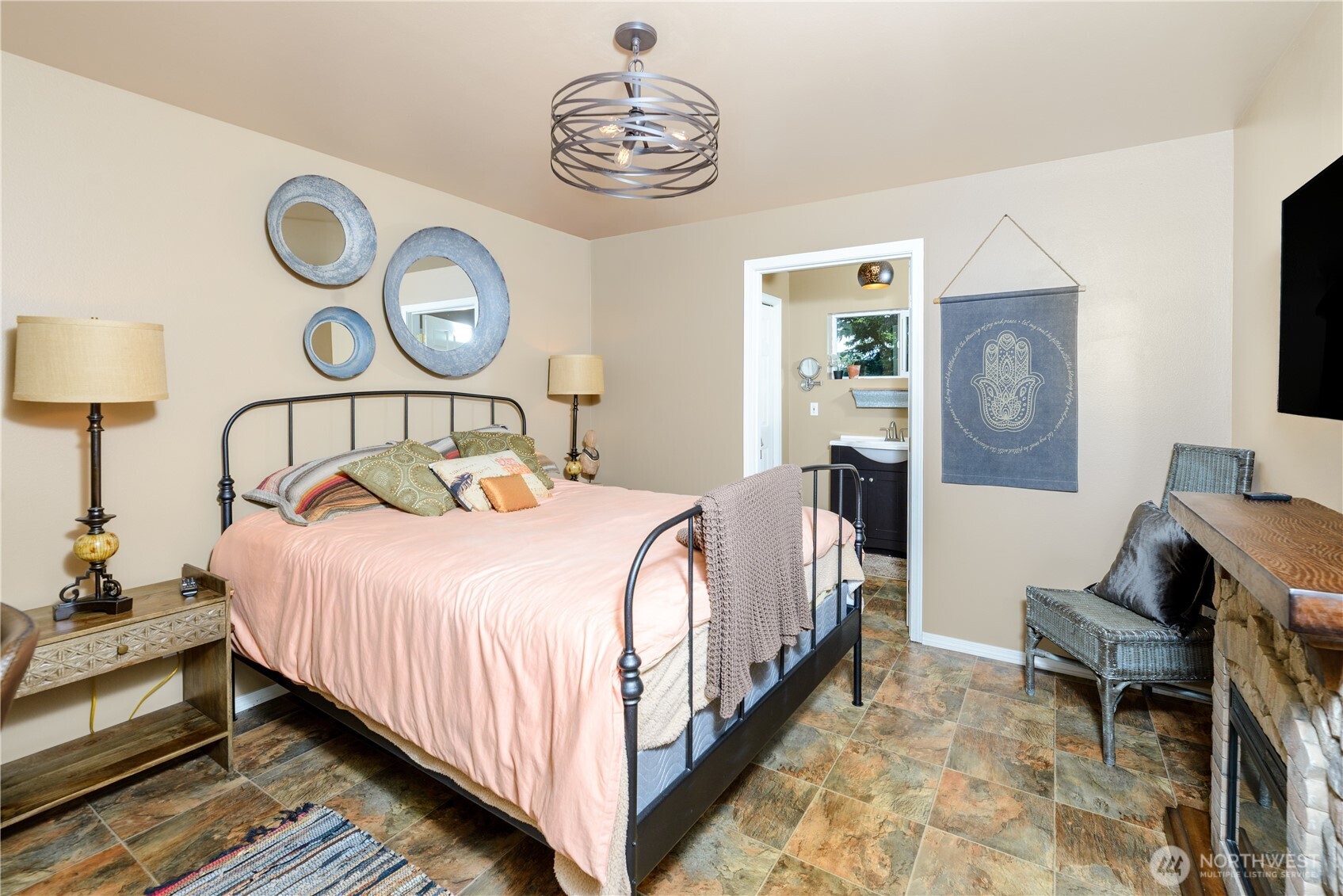 3718 Sequim-Dungeness Way Sequim, WA 98382 - Photo 26 of 40 a bedroom with a bed and a lamp on dresser