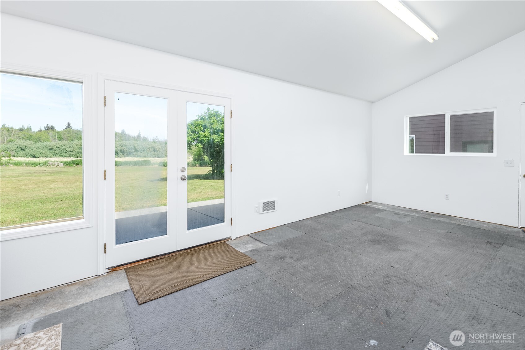 3718 Sequim-Dungeness Way Sequim, WA 98382 - Photo 31 of 40 a view of an empty room with a window
