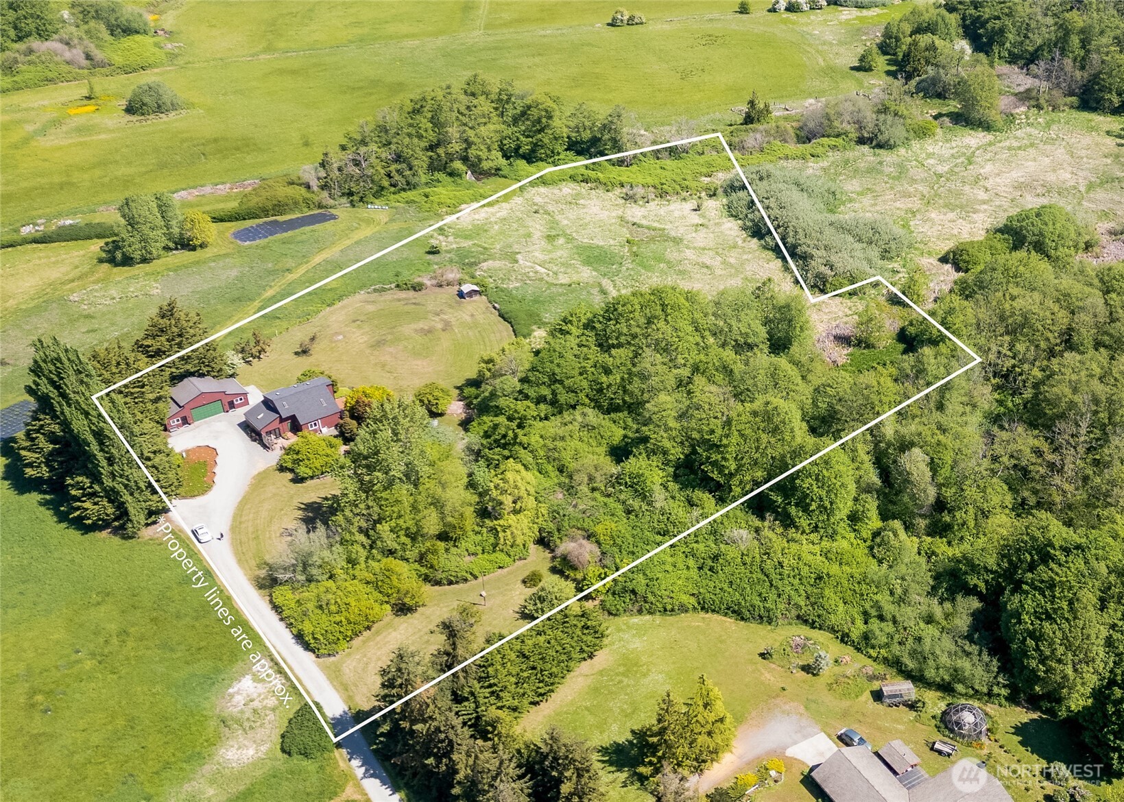 3718 Sequim-Dungeness Way Sequim, WA 98382 - Photo 40 of 40 an aerial view of residential houses with outdoor space