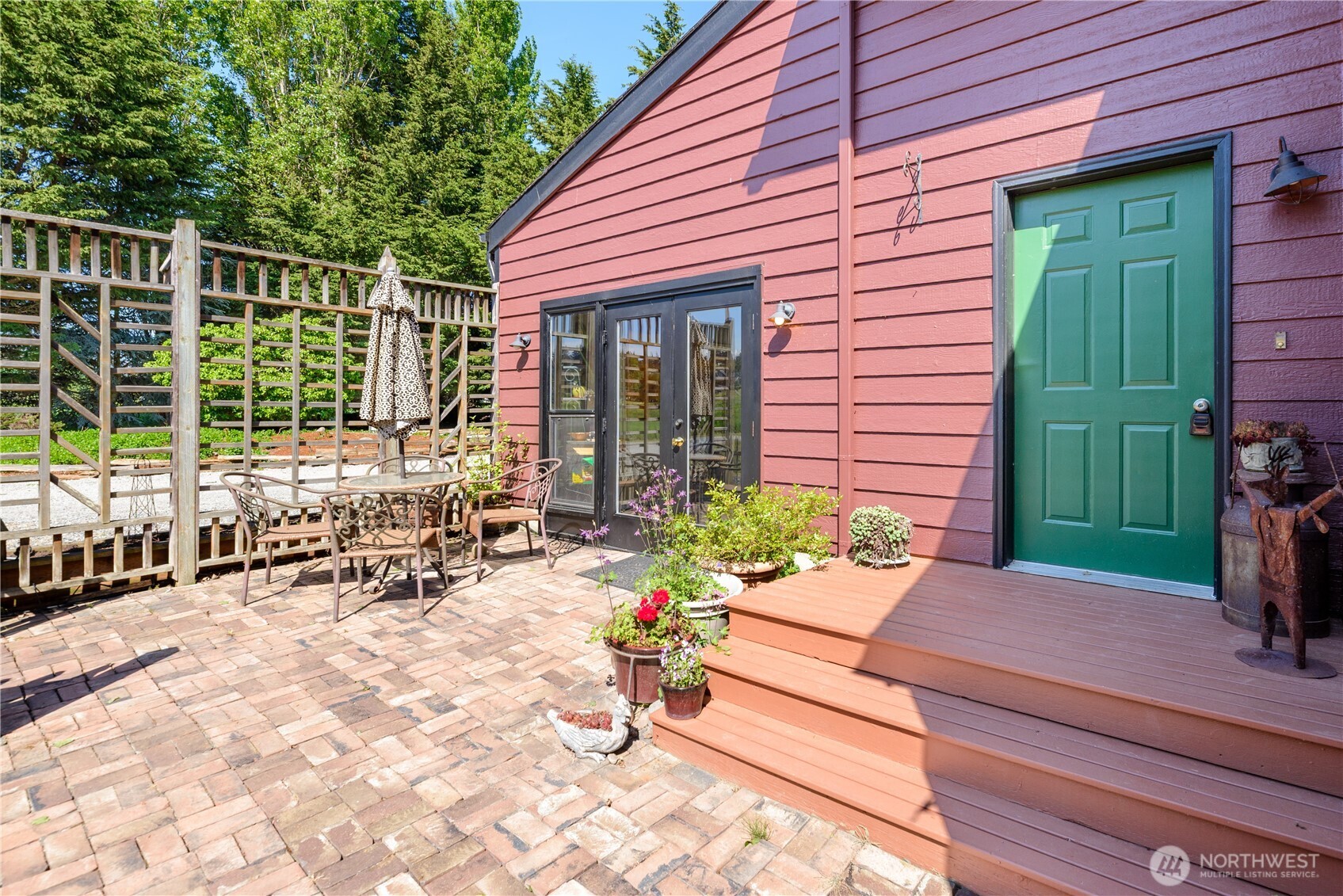 3718 Sequim-Dungeness Way Sequim, WA 98382 - Photo 5 of 40 a view of a house with sitting area and garden