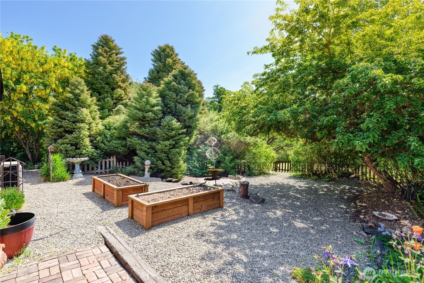 3718 Sequim-Dungeness Way Sequim, WA 98382 - Photo 6 of 40 a backyard of a house with yard and outdoor seating