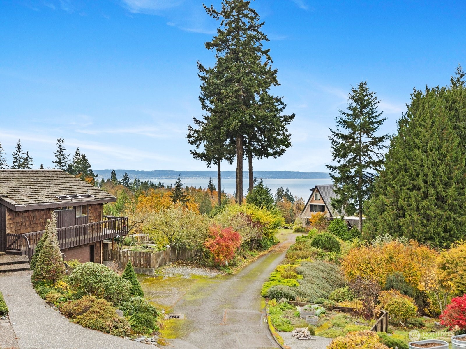 358 Heather Road Everett, WA 98203 - Photo 1 of 39 a view of a swimming pool with a patio