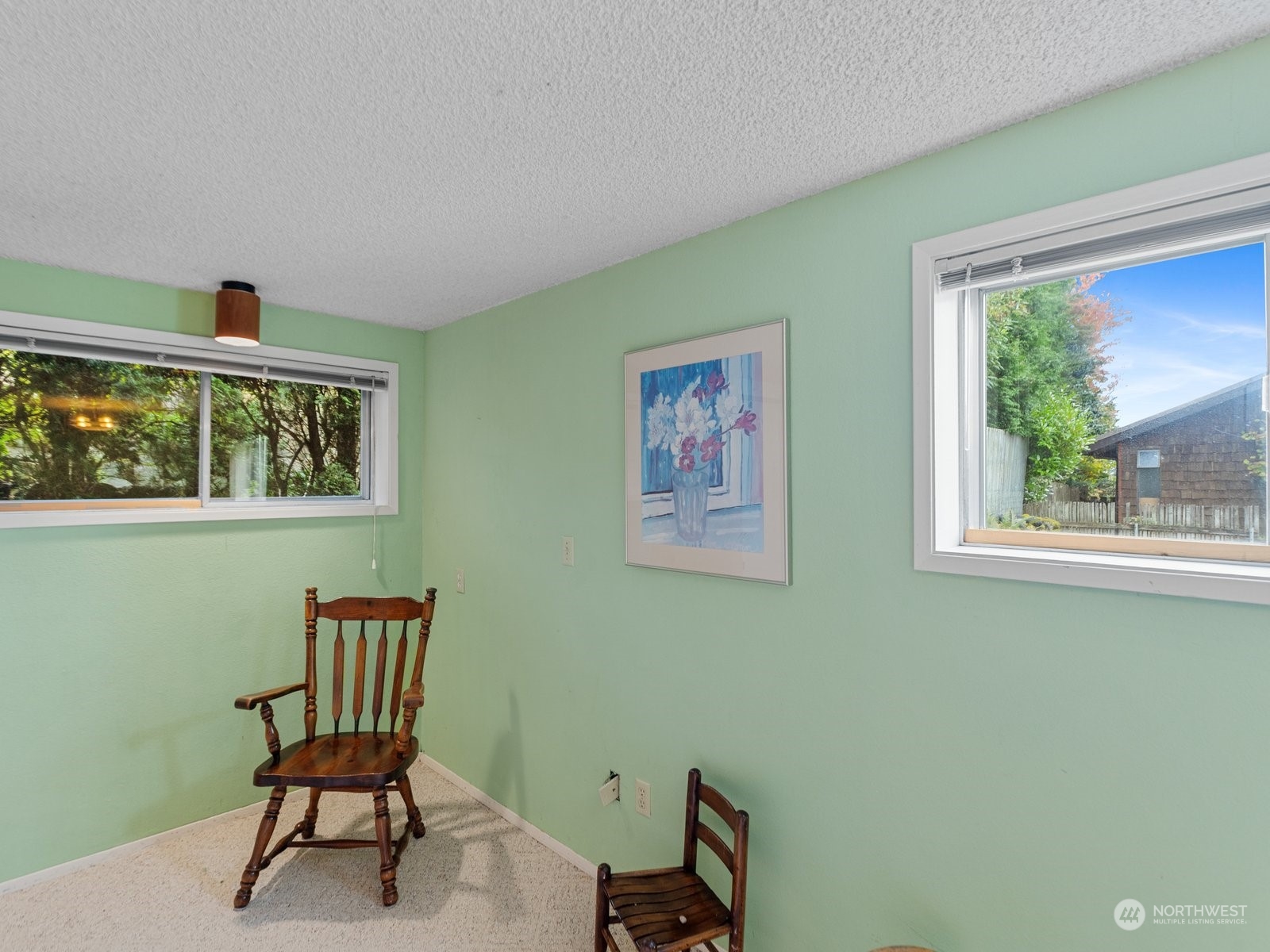358 Heather Road Everett, WA 98203 - Photo 30 of 39 a view of a workspace with furniture and a window
