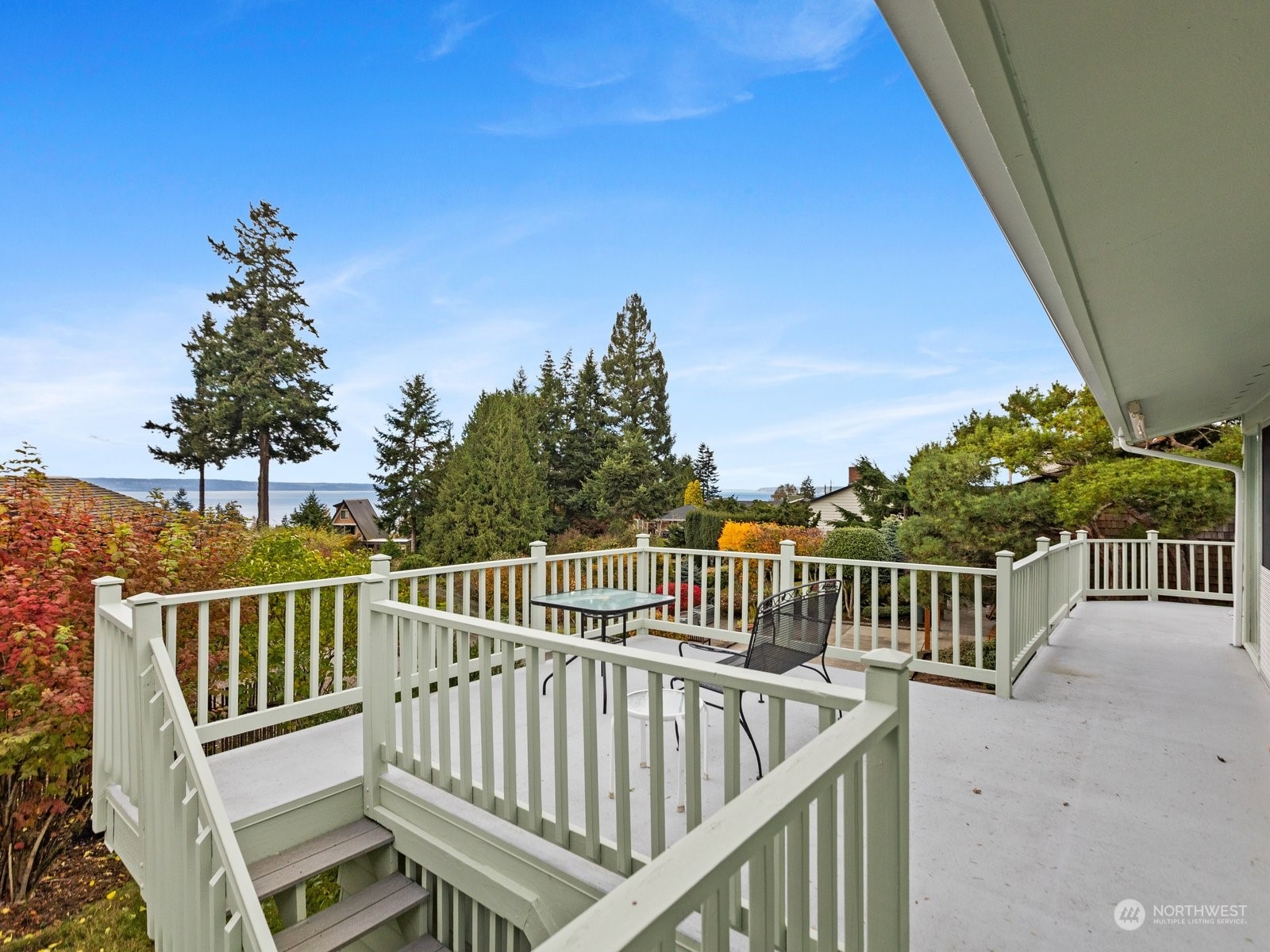 358 Heather Road Everett, WA 98203 - Photo 4 of 39 a view of a chair and table on the deck
