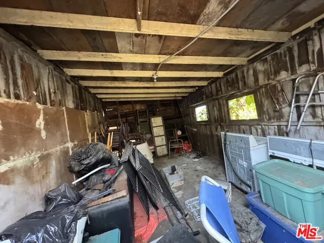 a room with furniture and a window