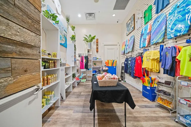 a swimming pool with outdoor seating and yard