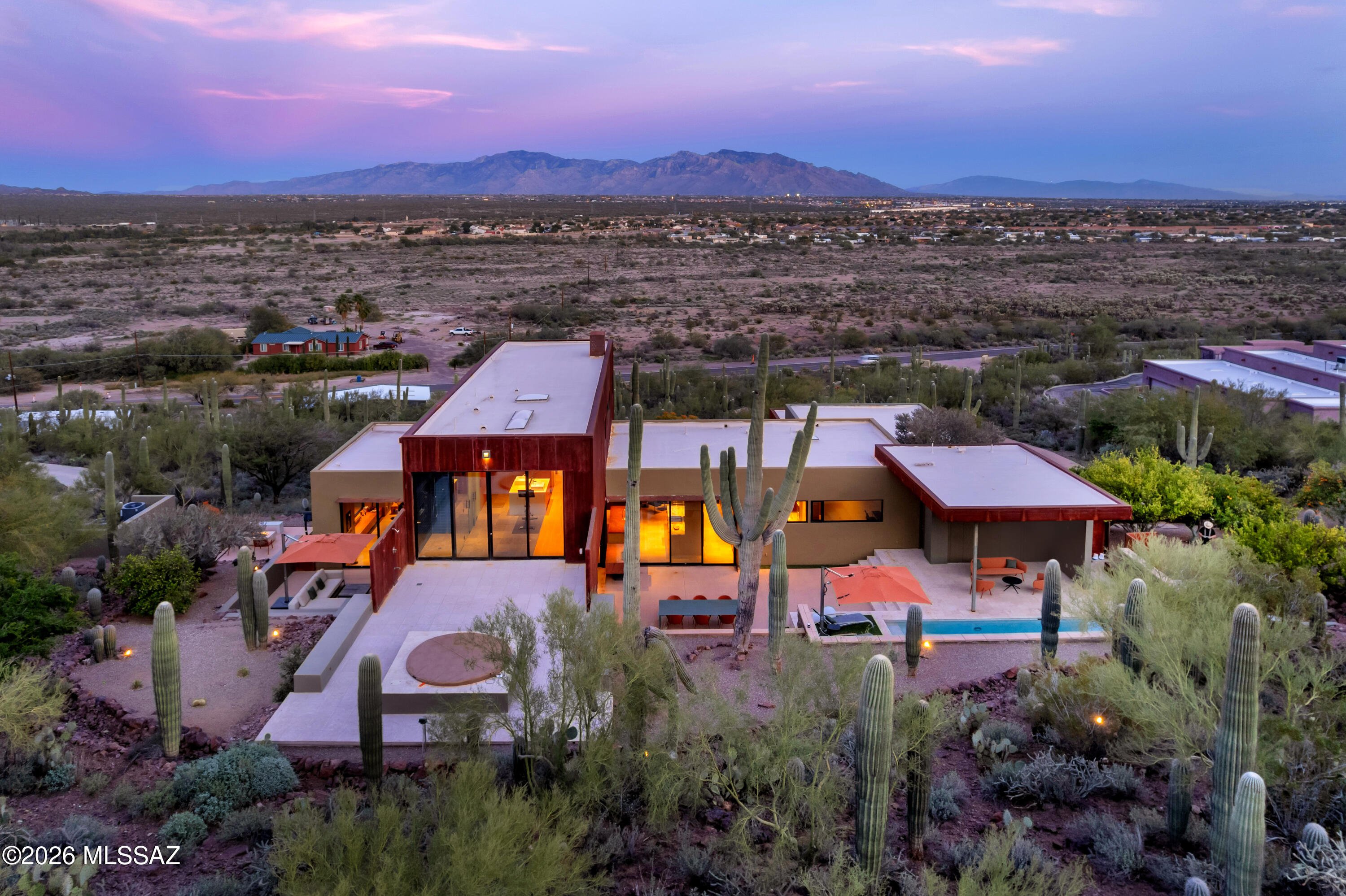 9971 North Silverbell Road Marana, AZ 85653 - Photo 3 of 34 an aerial view of an outdoor space swimming pool and mountain view