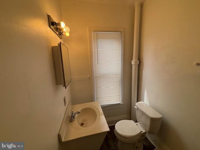 617 Jessop Place York, PA 17401 - Photo 6 of 7 a bathroom with a sink a toilet and shower