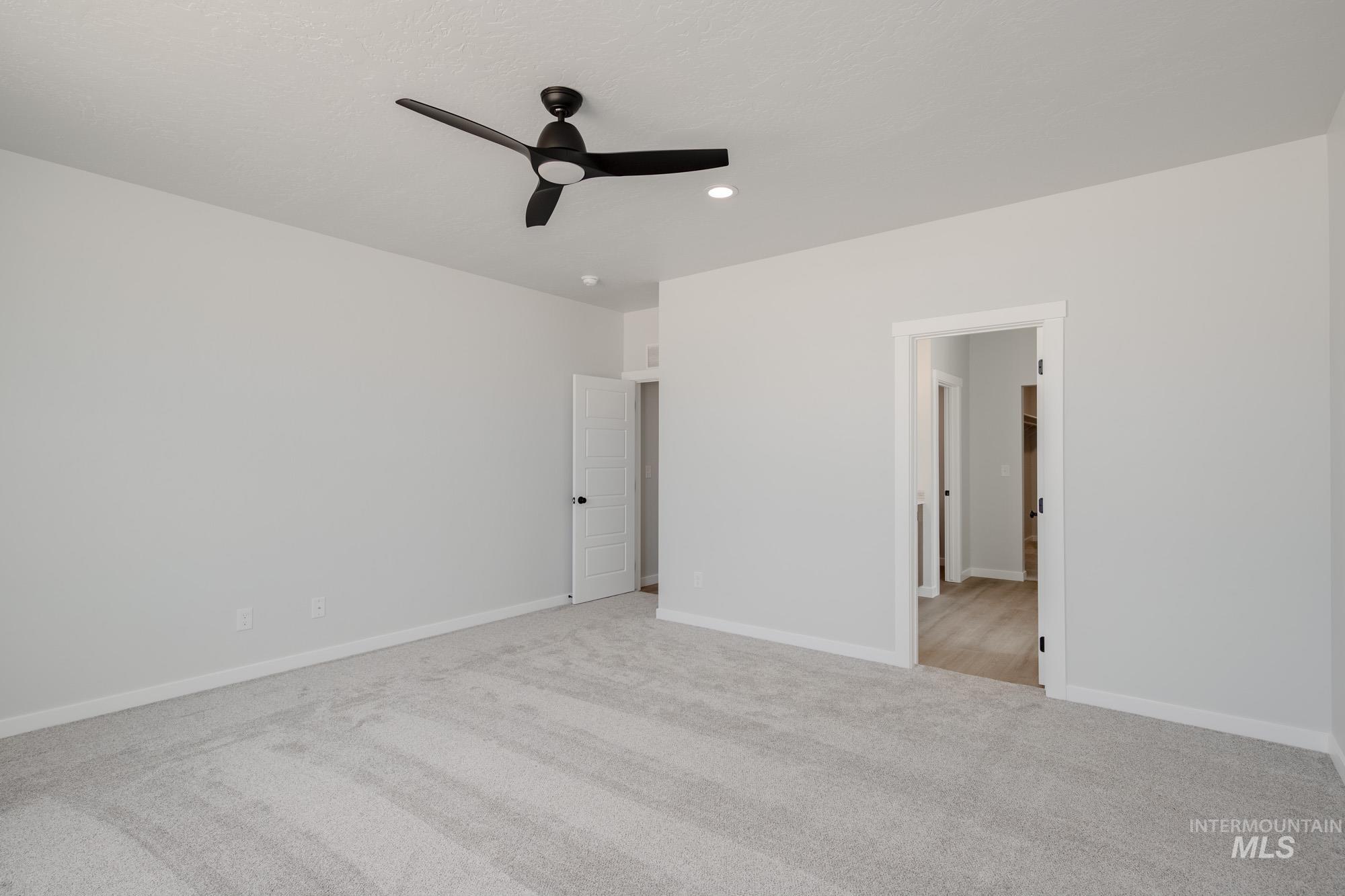 5131 Castleton Avenue Nampa, ID 83686 - Photo 22 of 25 Unfurnished bedroom with carpet, recessed lighting, and a ceiling fan