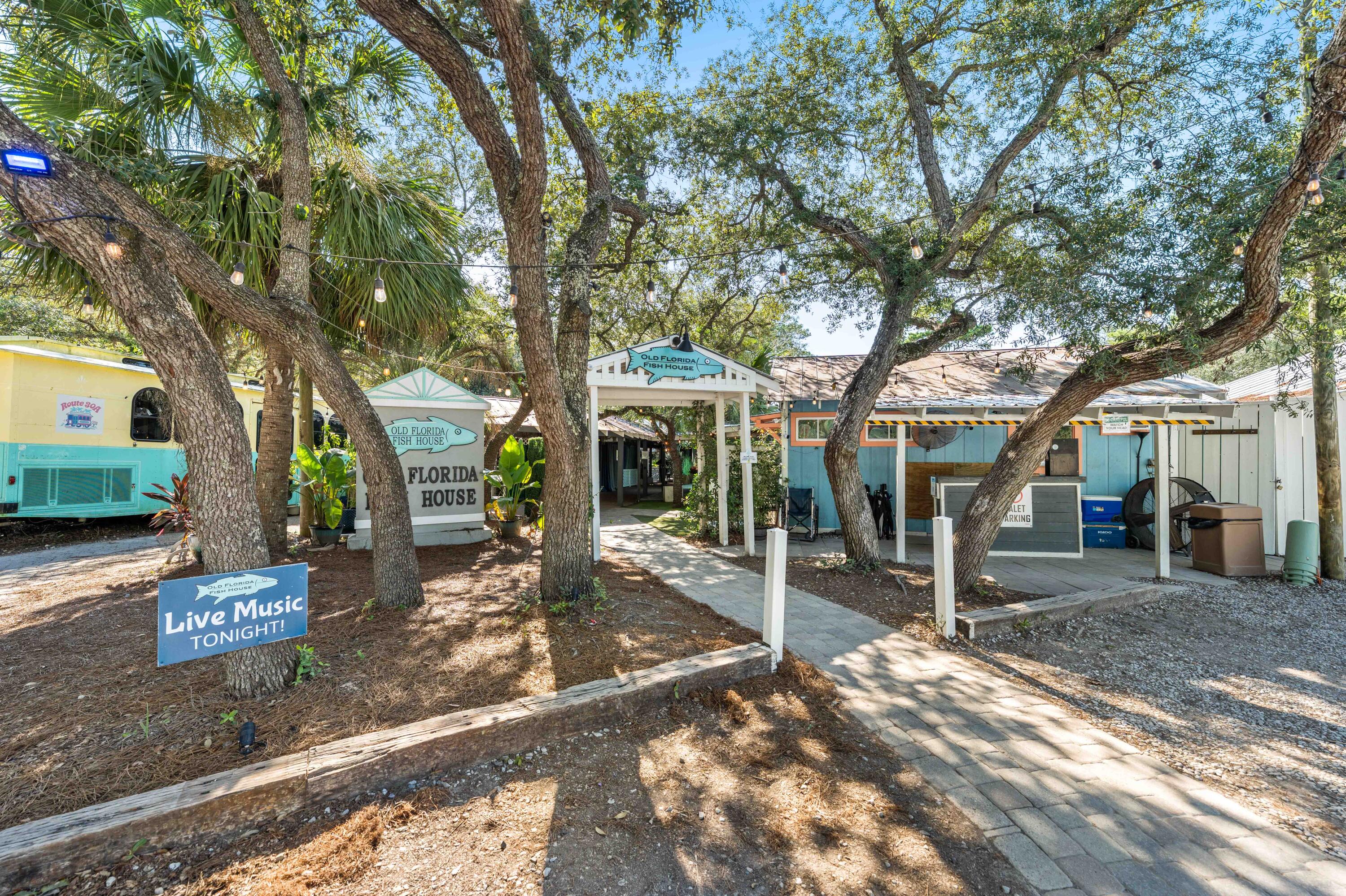 288 Lakeview Drive Santa Rosa Beach, FL 32459 - Photo 21 of 28 a view of a house with a tree in front of it