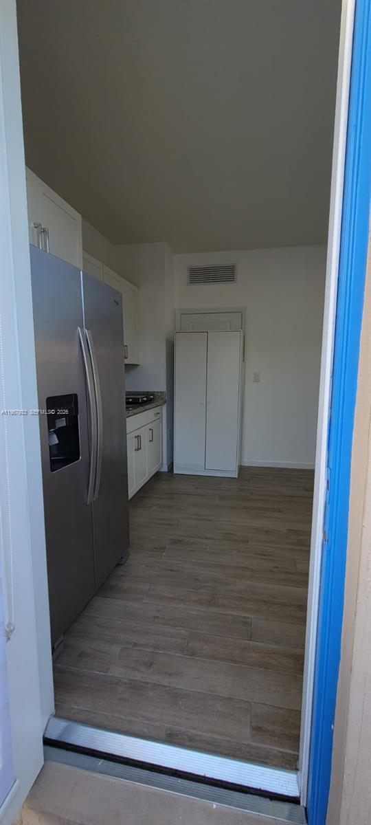 27118 Southwest 132 Ct Road Homestead, FL 33032 - Photo 2 of 9 a view of cabinets and refrigerator
