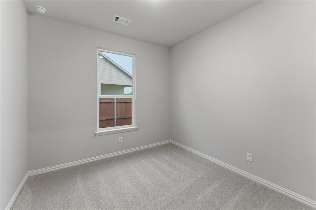1237 Frio Drive Springtown, TX 76082 - Photo 15 of 25 Neutral gray walls complementing light gray carpeting