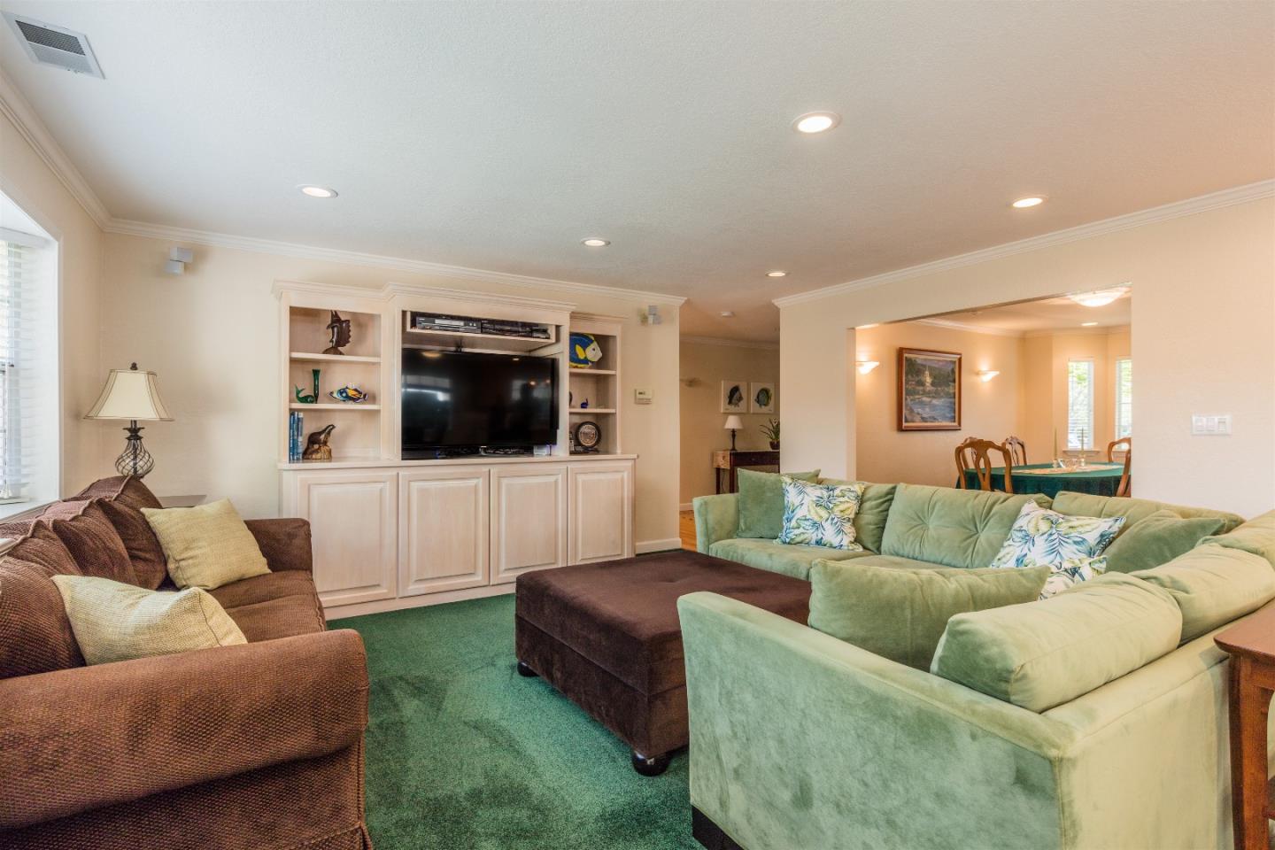 1686 Ebbetts Drive Campbell, CA 95008 - Photo 19 of 31 a living room with furniture and a flat screen tv