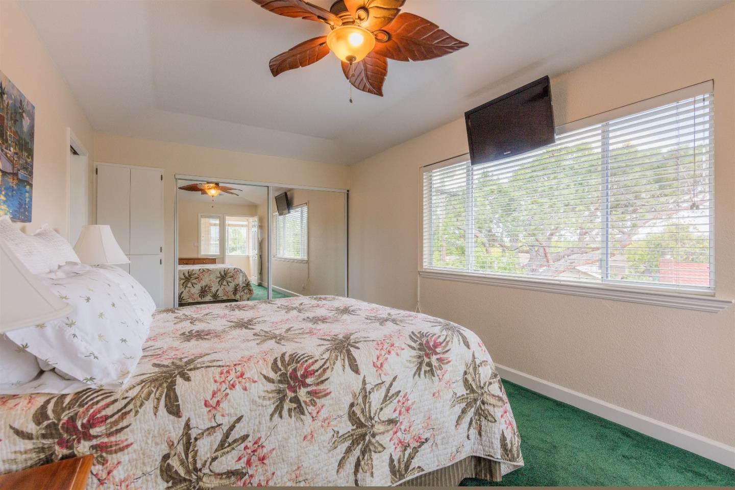 1686 Ebbetts Drive Campbell, CA 95008 - Photo 21 of 31 a bedroom with a large bed and a window