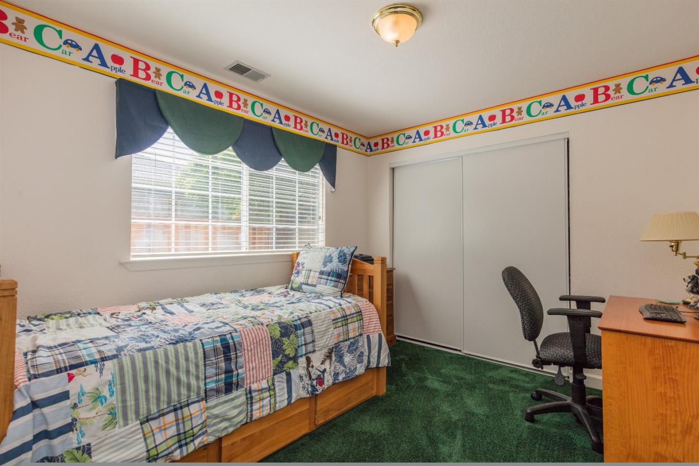 1686 Ebbetts Drive Campbell, CA 95008 - Photo 26 of 31 a bedroom with a bed and a window