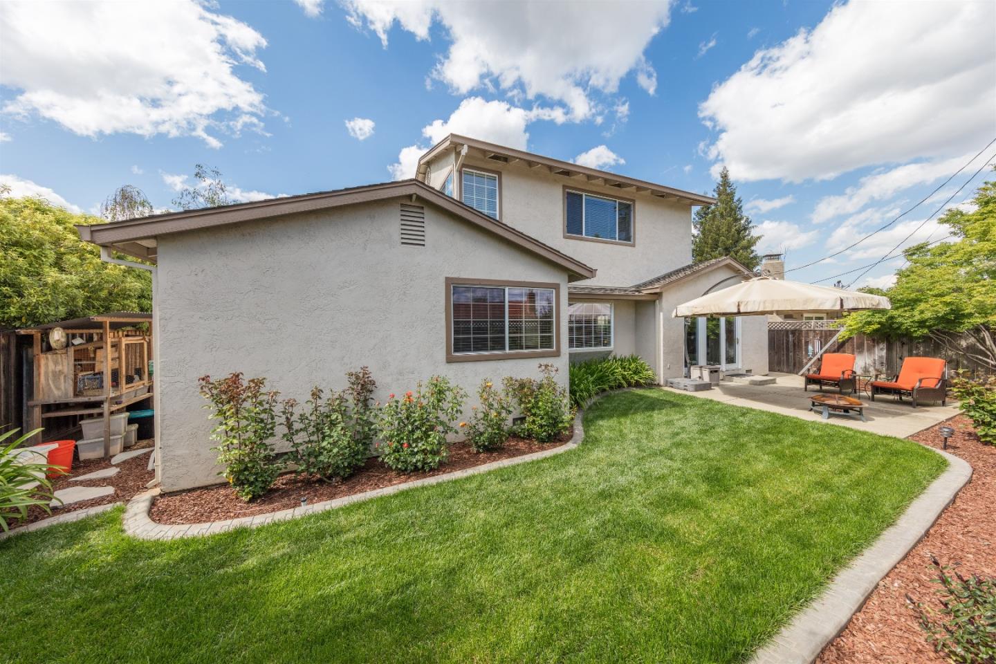 1686 Ebbetts Drive Campbell, CA 95008 - Photo 27 of 31 a front view of house with yard and outdoor seating