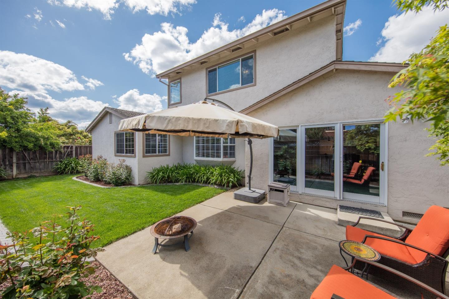 1686 Ebbetts Drive Campbell, CA 95008 - Photo 28 of 31 a view of a house with backyard sitting area and garden