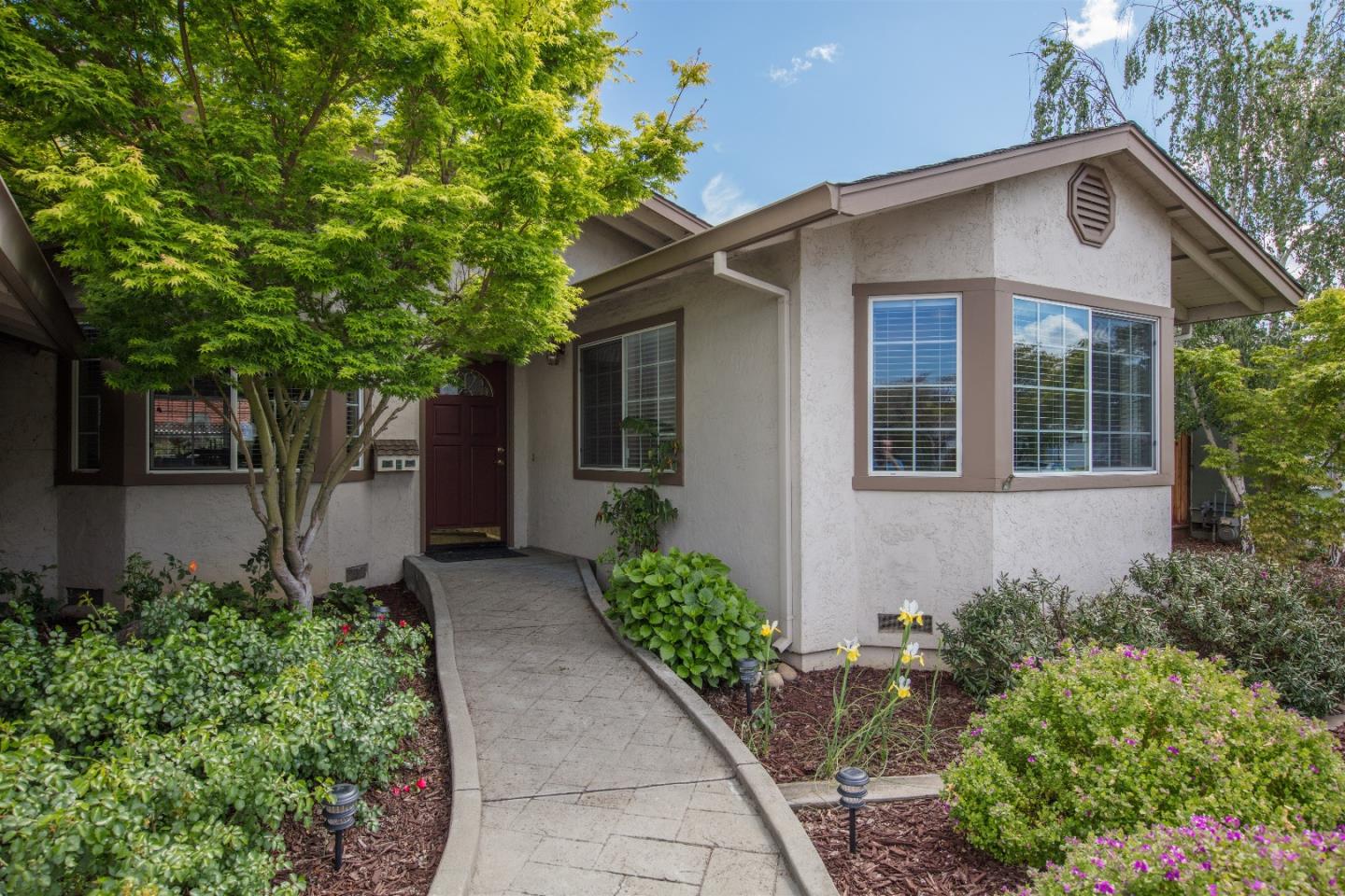 1686 Ebbetts Drive Campbell, CA 95008 - Photo 3 of 31 a front view of a house with garden