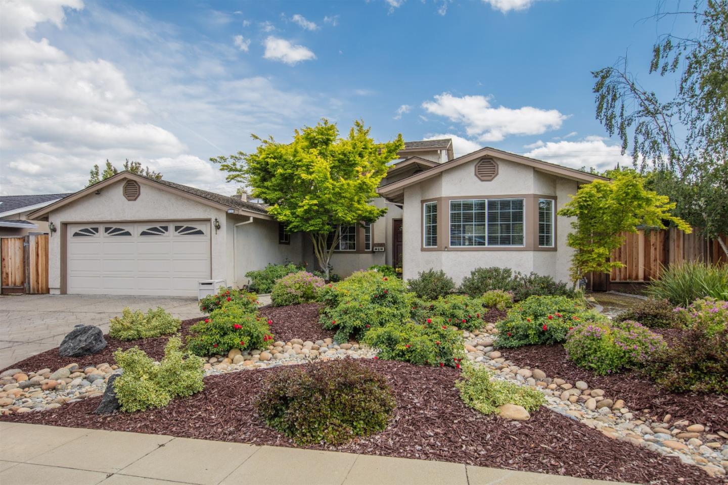 1686 Ebbetts Drive Campbell, CA 95008 - Photo 4 of 31 a front view of a house with a yard