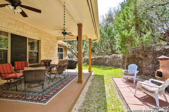 a front view of house with outdoor seating