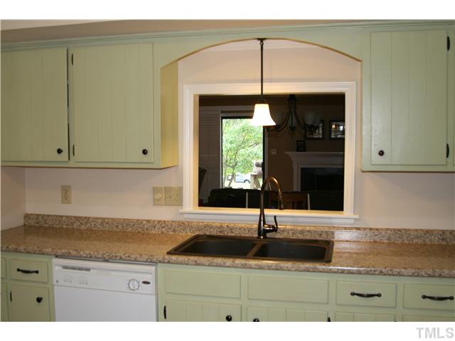 1524 Woodcroft Drive Raleigh, NC 27609 - Photo 12 of 25 a bathroom with a sink and a mirror