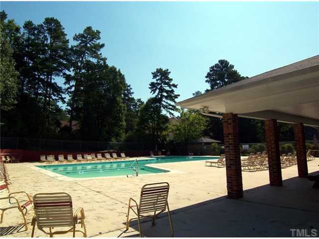 1524 Woodcroft Drive Raleigh, NC 27609 - Photo 23 of 25 a view of a swimming pool with a patio