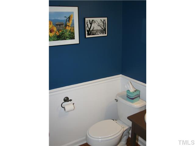 1524 Woodcroft Drive Raleigh, NC 27609 - Photo 9 of 25 a bathroom with a toilet and a shower
