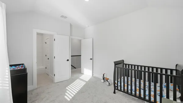 a view of a hallway with closet area