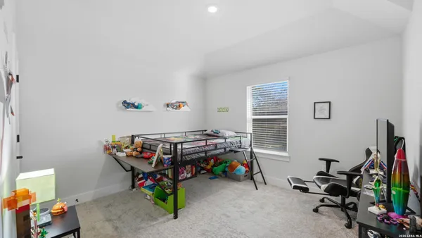 a room with furniture and a window