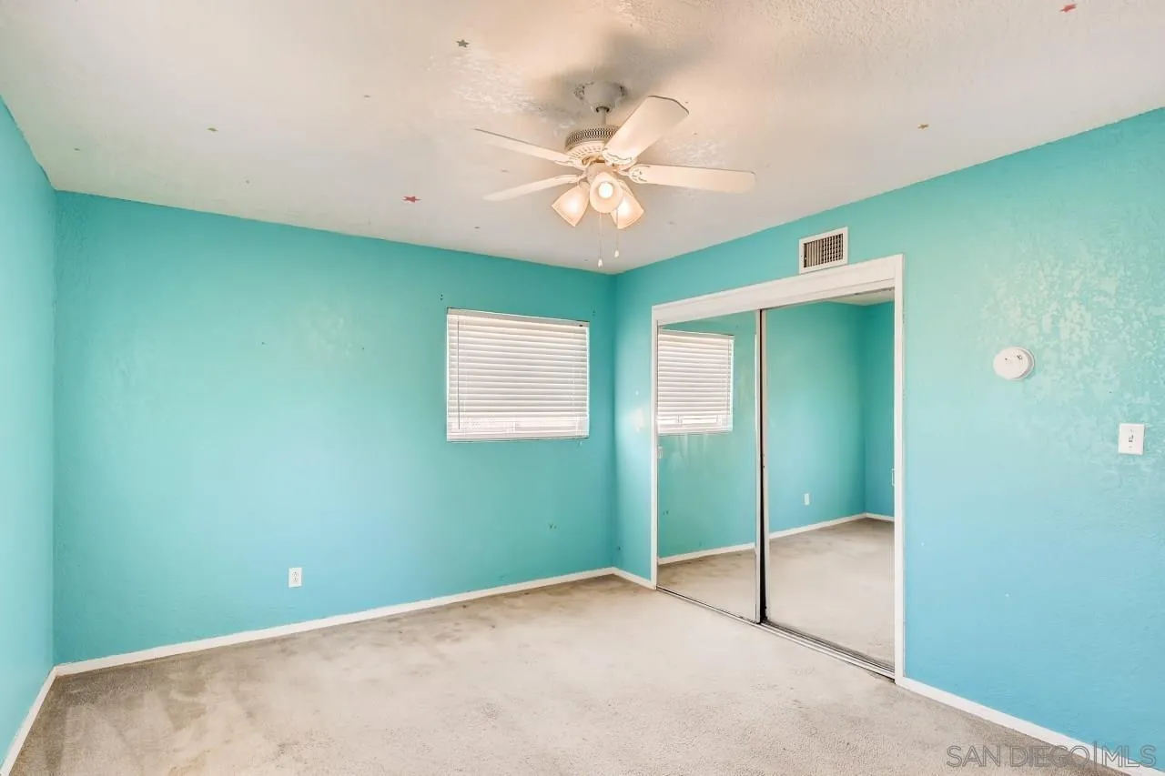 139 Landale Lane El Cajon, CA 92019 - Photo 6 of 11 a view of a room with a ceiling fan and a window