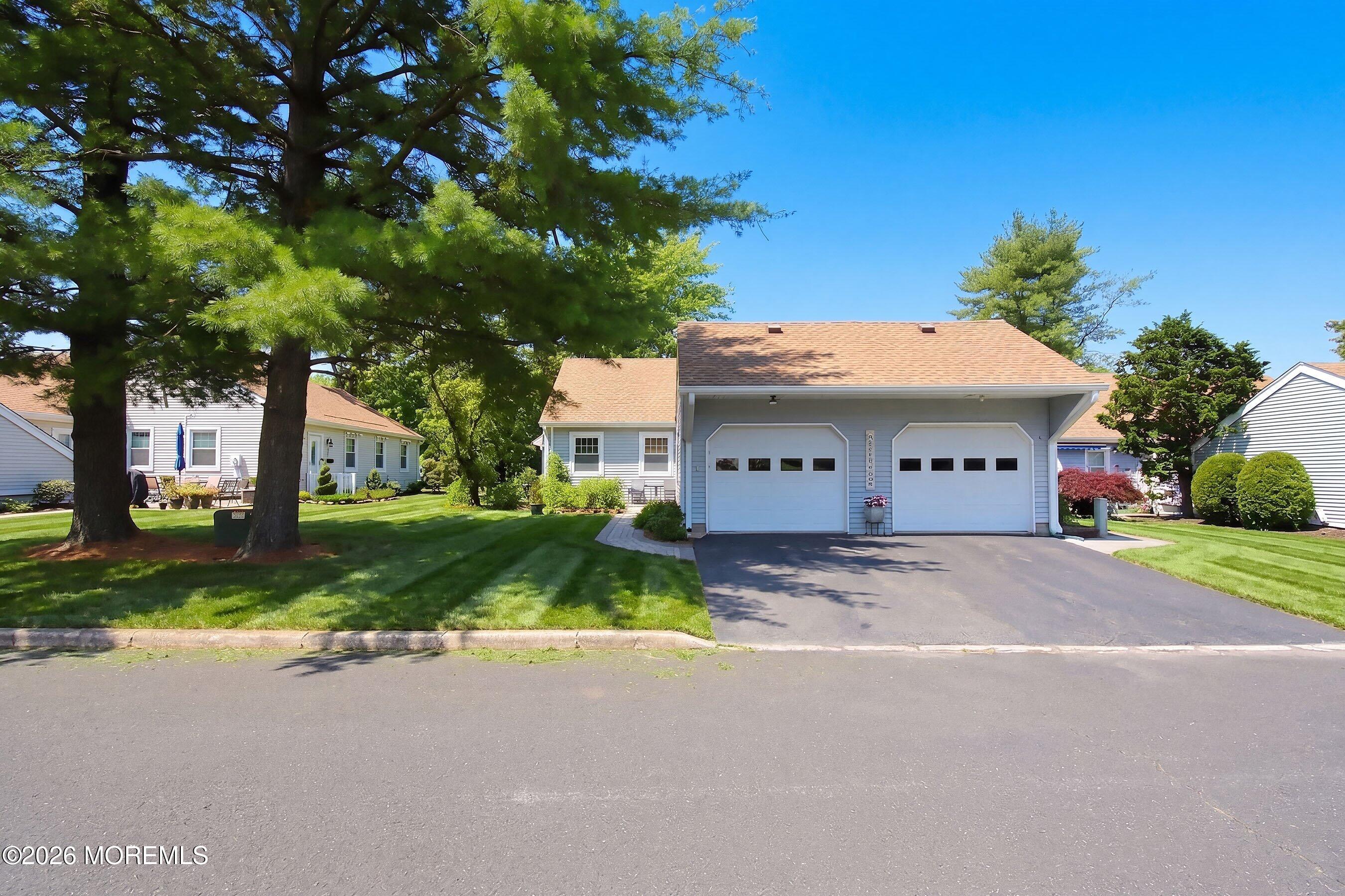 96 Halls Croft Road, Unit D Freehold, NJ 07728 - Photo 1 of 27 02-Front grass