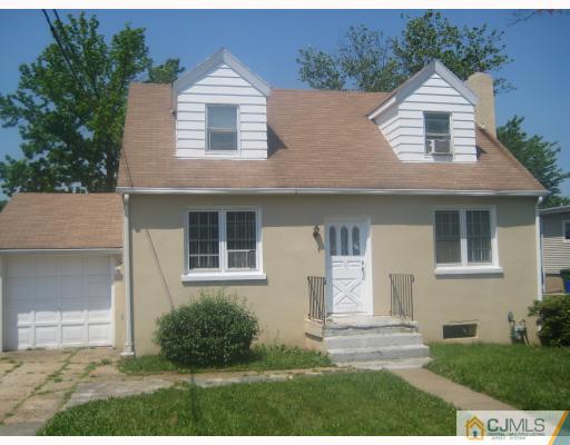 195 Plainfield Road Edison, NJ 08820 - Photo 1 of 4 front view of a house with a yard