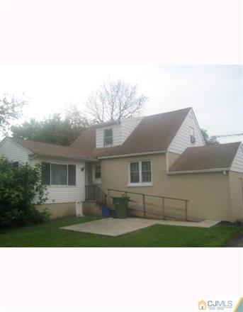 195 Plainfield Road Edison, NJ 08820 - Photo 3 of 4 a view of a yard in front of a house