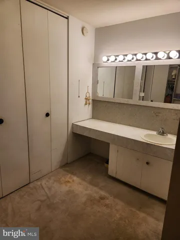 a room with furniture and large windows