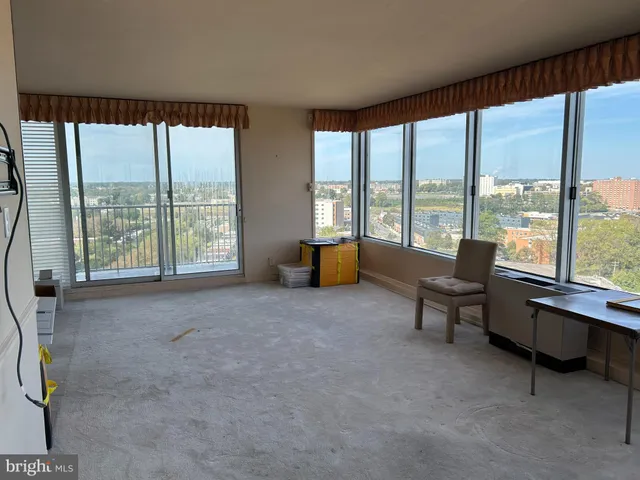 a room with a bed and a window