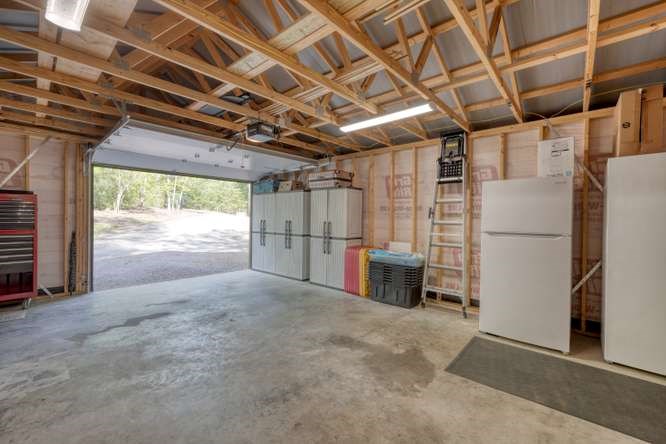 130 Coopers Ridge Road Murphy, NC 28906 - Photo 26 of 32 a view of empty room with wooden walls